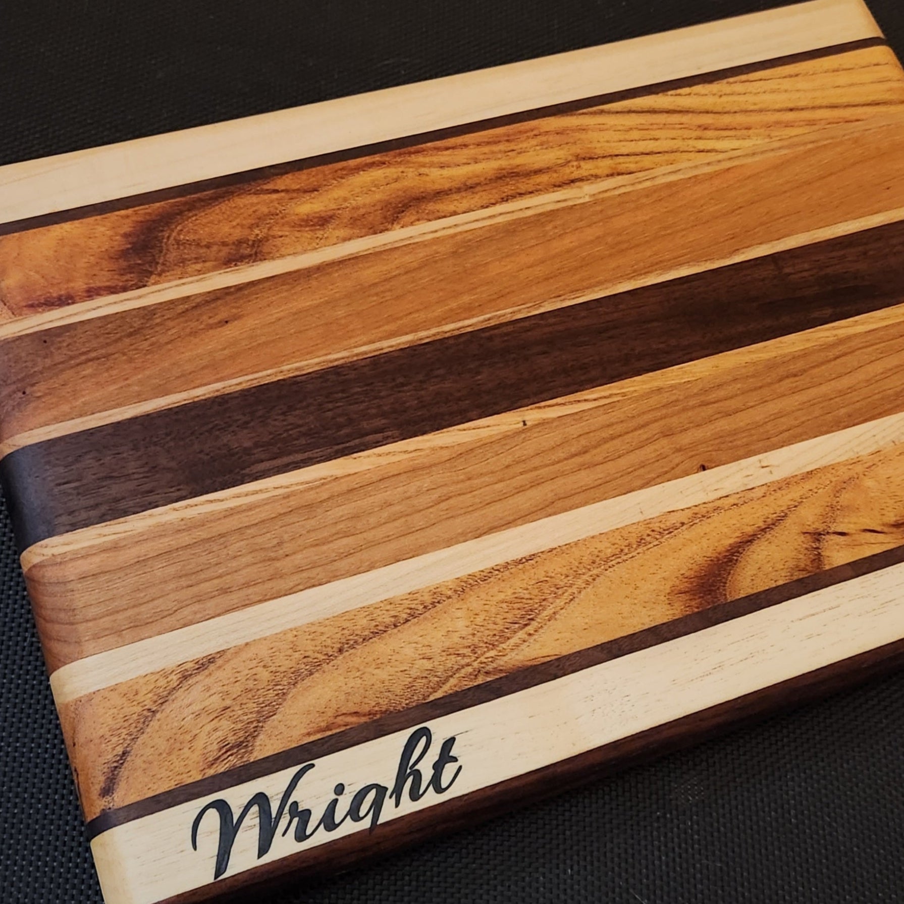 Cutting board with epoxy engraving, custom monogram board